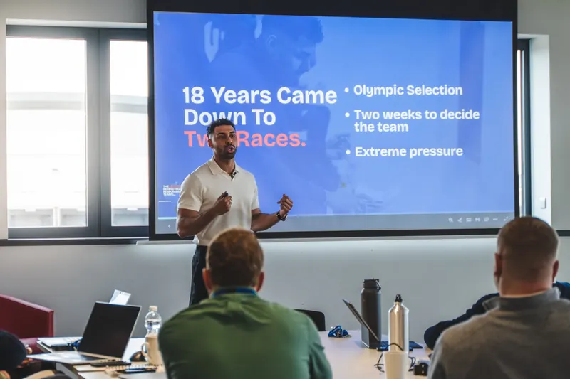 Leon Greenwood presenting a slide that reads 18 Years Came Down To Two Races